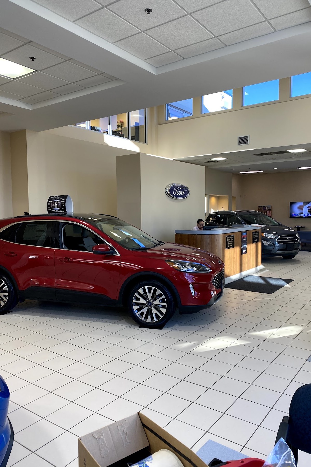 The showroom floor at Huntley Ford, with a Ford Escape on display