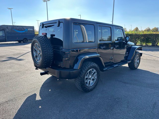 2016 Jeep Wrangler Unlimited Sahara — photo 4 of 25