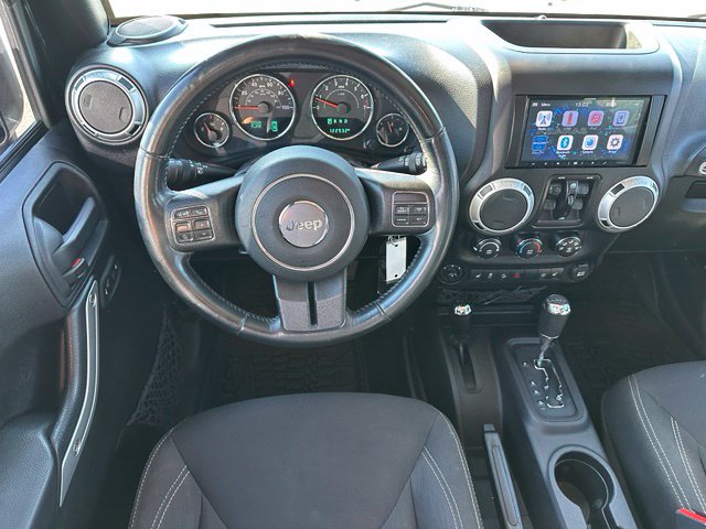2016 Jeep Wrangler Unlimited Sahara — photo 14 of 25