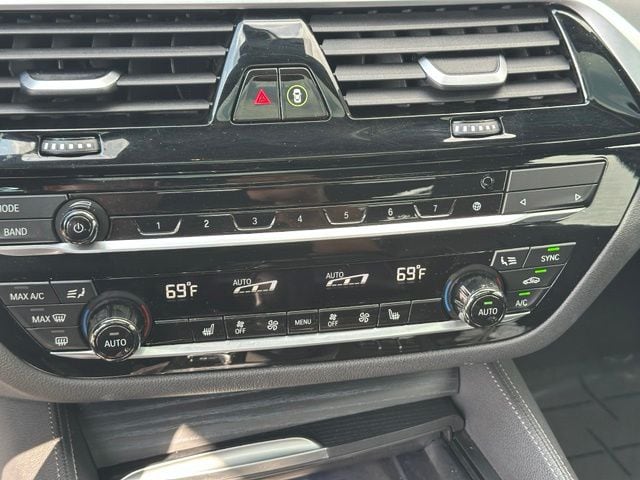 2023 BMW 5 Series M550i xDrive — photo 26 of 32